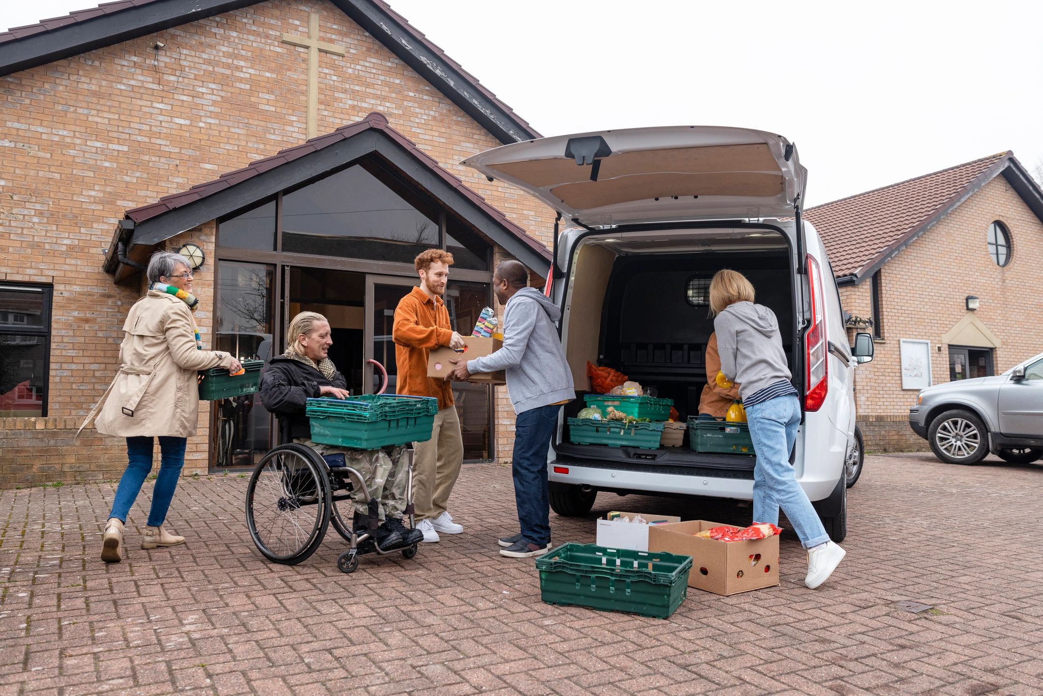 Community outreach volunteers serving together